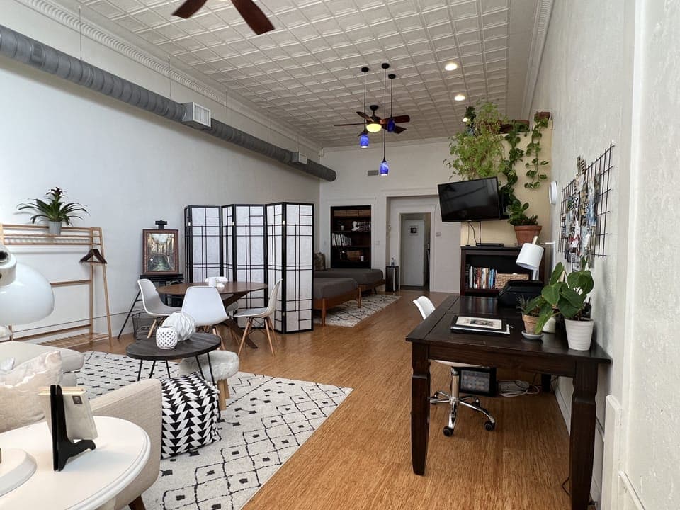 900 sq ft loft with living, dining, and office/art areas