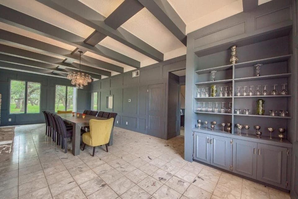 Wine and cocktail glasses in formal dinning room. 