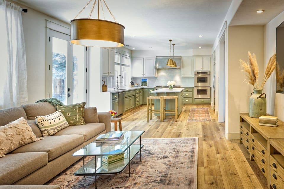 Second living room with 85" smart TV off of kitchen