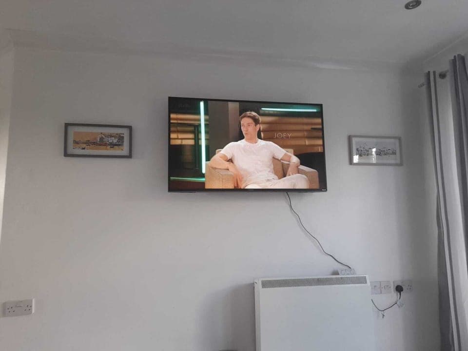 TV in Lounge Wall mounted with Netflix
