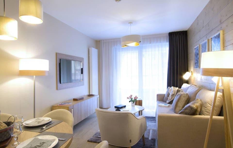 Kick back your feet and relax in the cozy living area.