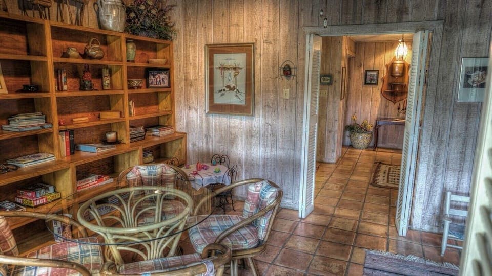 Library/Game room, doors close, Queen sofa bed, game table & games