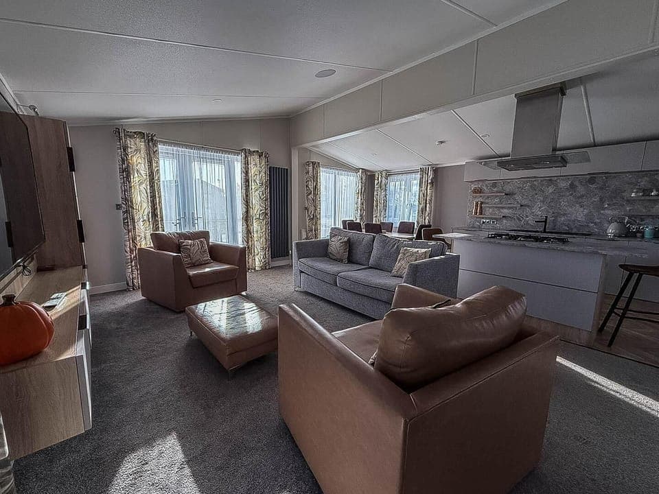 Spacious living room with cozy seating and natural light