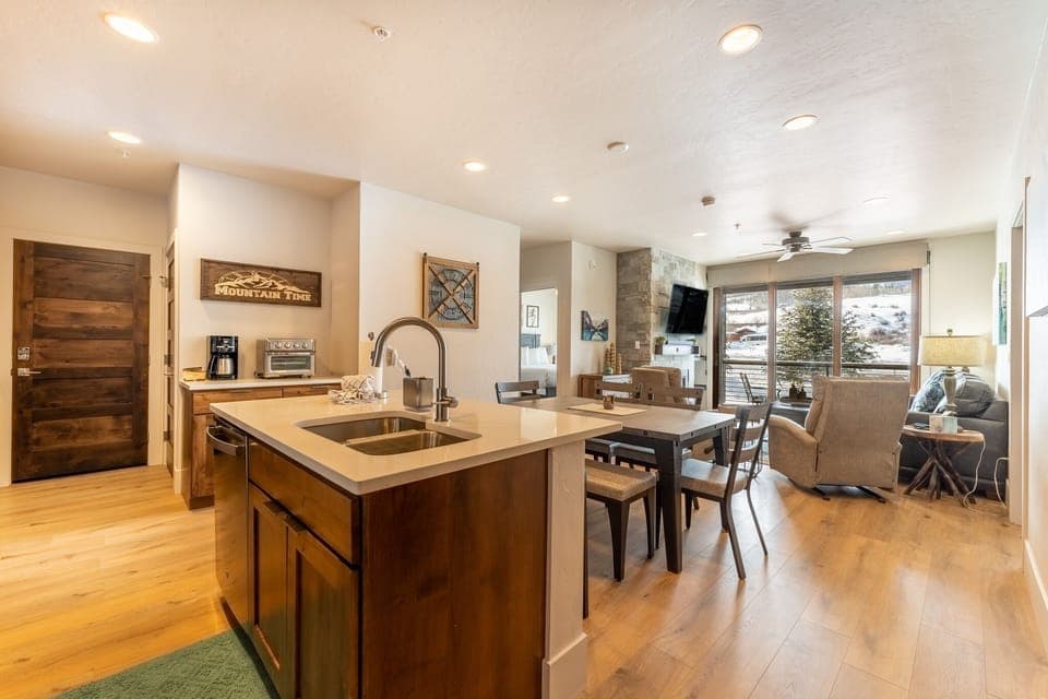 Open concept kitchen, dining and living area.