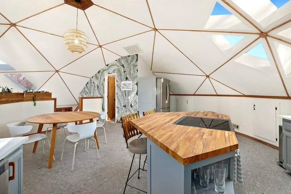 The upstairs is home to our fully renovated kitchen - our favorite place to enjoy the DOME shape of the house!