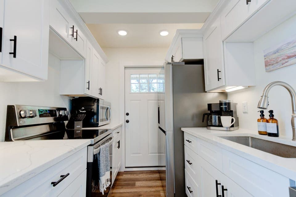 New, clean kitchen with enough to kitchenware for you and your guests