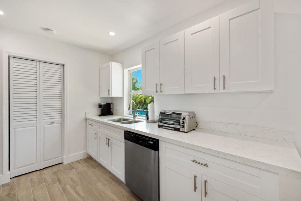 The laundry room is behind the bi-fold doors