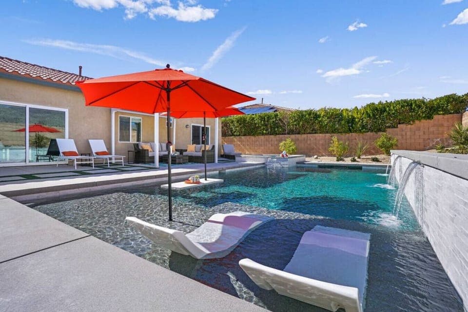 Enjoy the large heated pool and spa in our gorgeous completely new backyard!