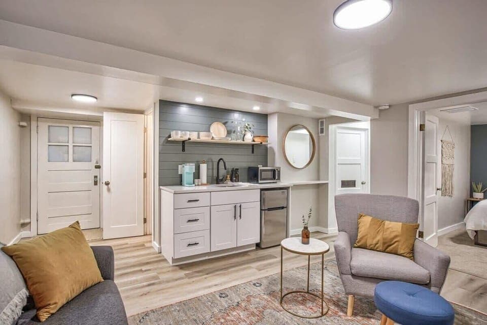 Kitchenette equipped with a sink, microwave, mini fridge, and Keurig coffee maker to your meet your basic needs