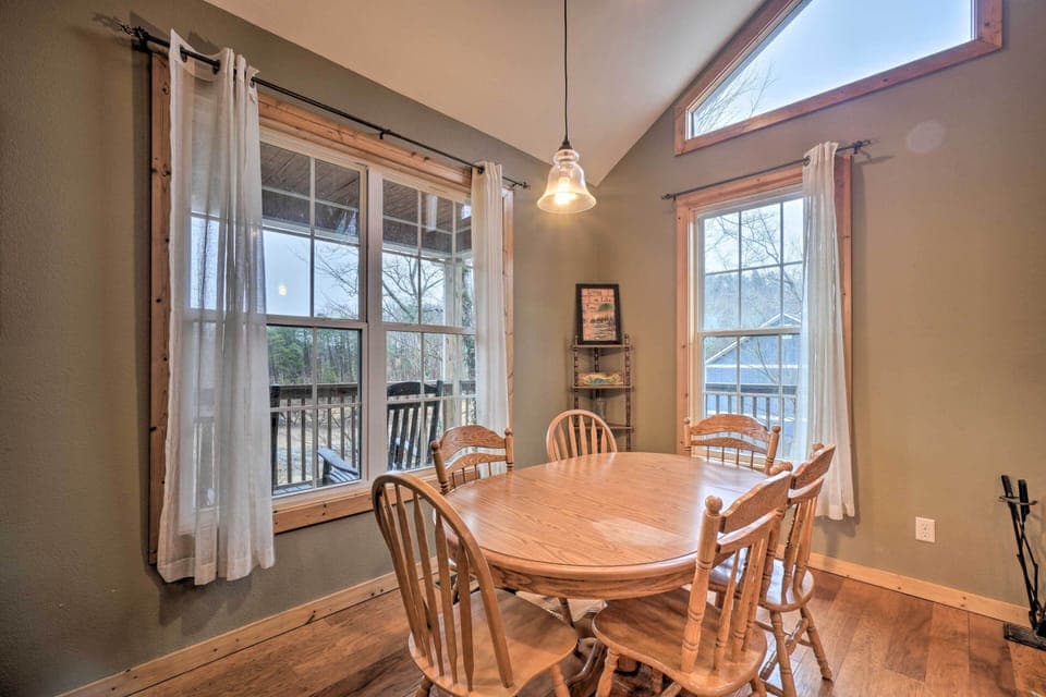 Dining Area | Dishware & Flatware Provided | Breakfast Bar w/ Additional Seating