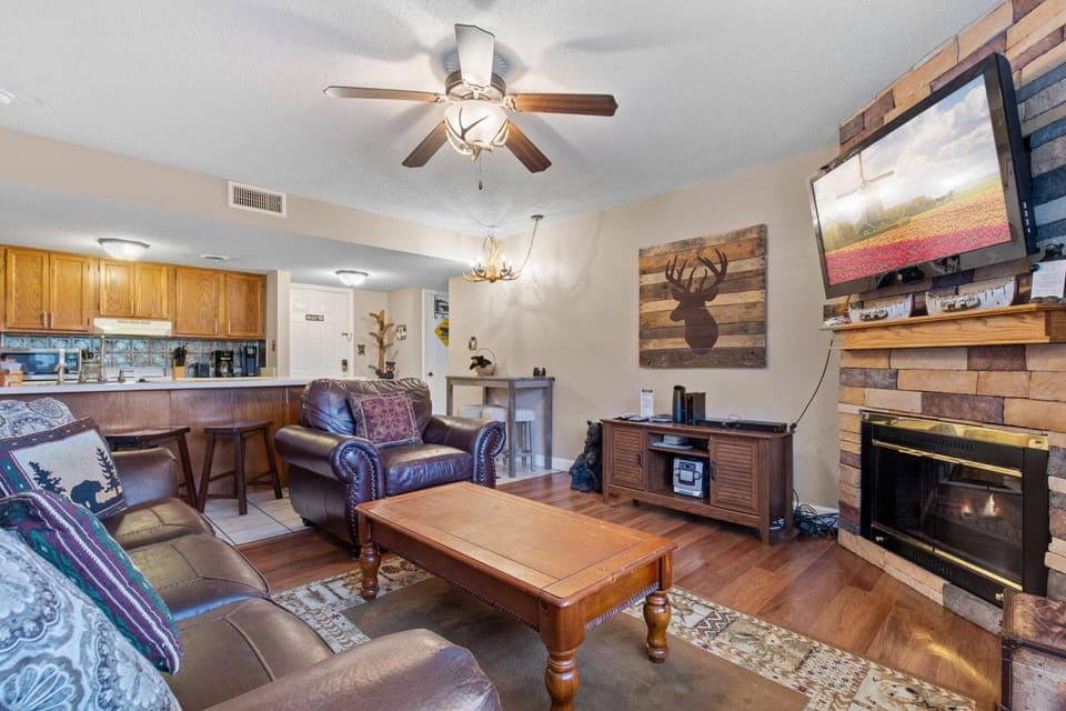 Living Room with a Gas Fireplace and Smart TV