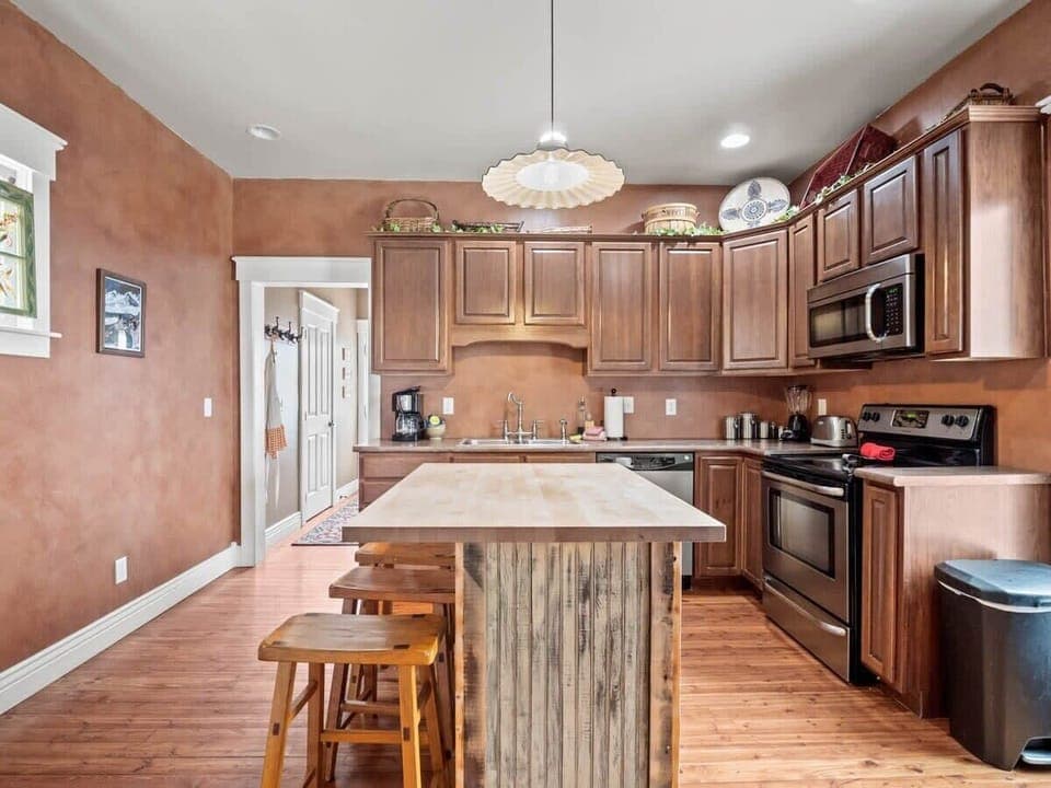 【Kitchen — Second】 Second full kitchen on the other level — full-size appliances and prep space.