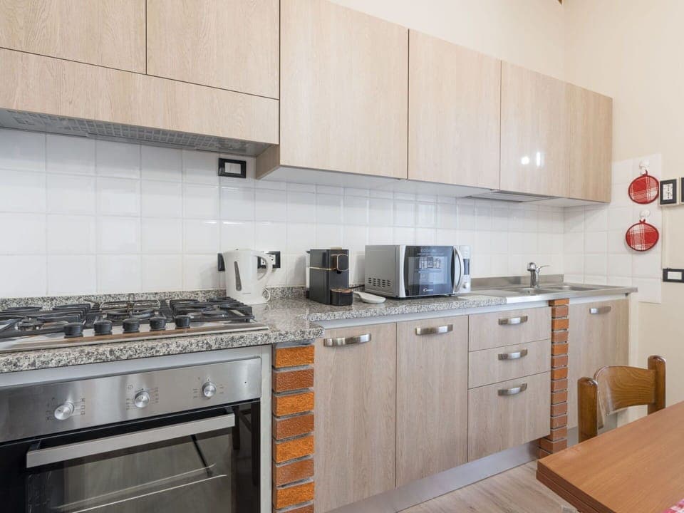 Cabinetry, Property, Countertop, Kitchen Stove, Kitchen, Kitchen Appliance, Home Appliance, Cooktop, Stove, Wood