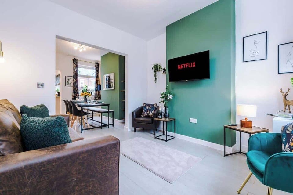 The living room benefits from a sofa bed and plenty of space to sit down and relax.