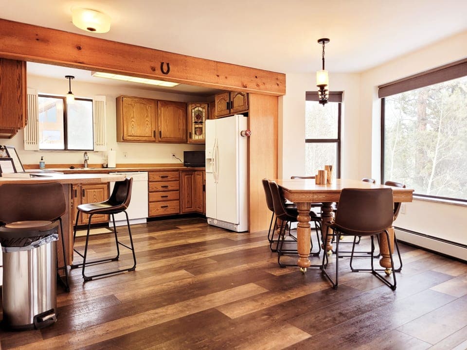 Fully equipped kitchen with seating for 8.