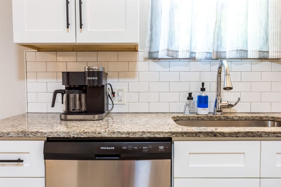 The coffee maker is always ready for a fresh cup of coffee, and the dishwasher makes clean up a breeze.