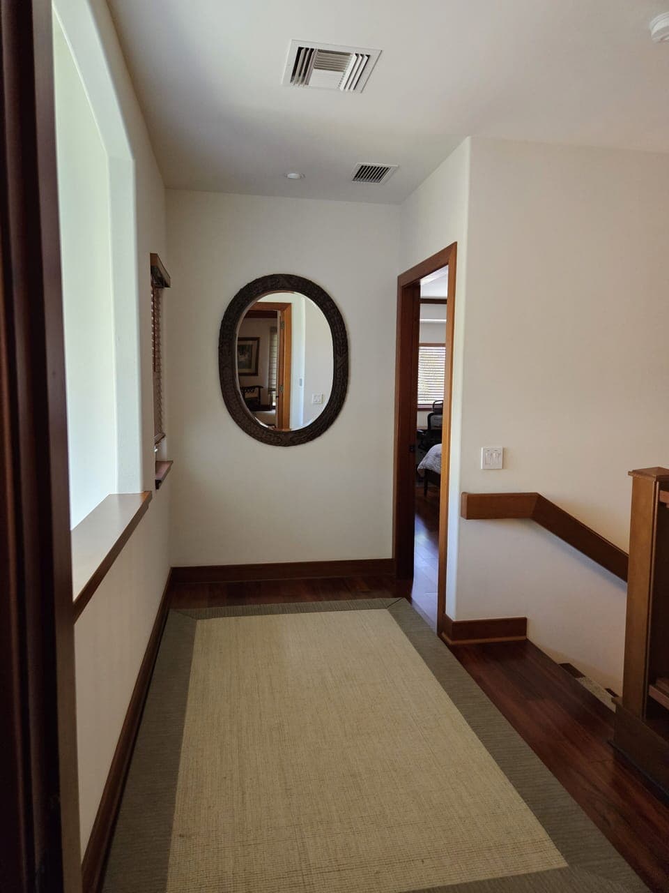 Landing separates the bedrooms for privacy.