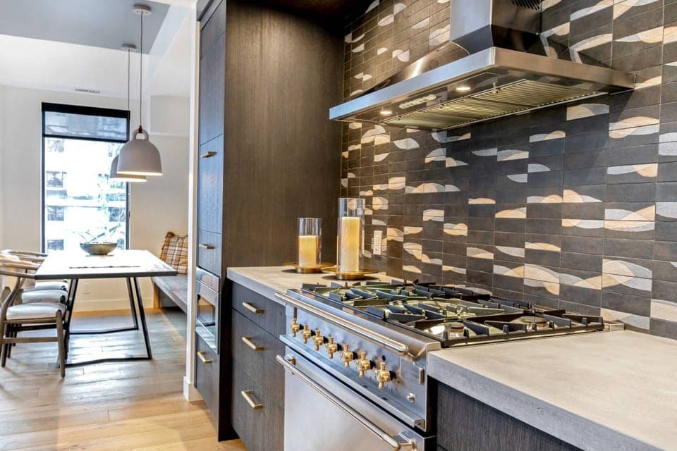 Kitchen features high end appliances, such as a Aga Gas Range