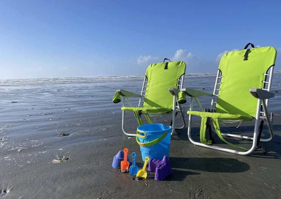 Head to the beach, we have chairs and toys!