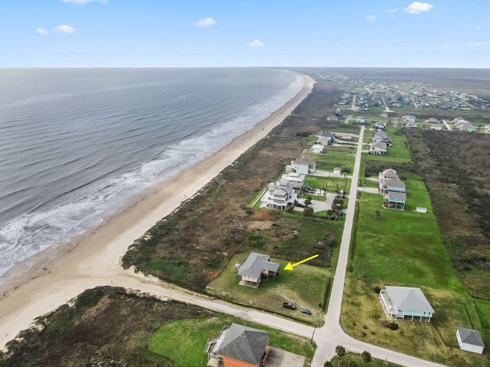 Long wide beach just outside the house, endless views. House is on 0.7 acre land