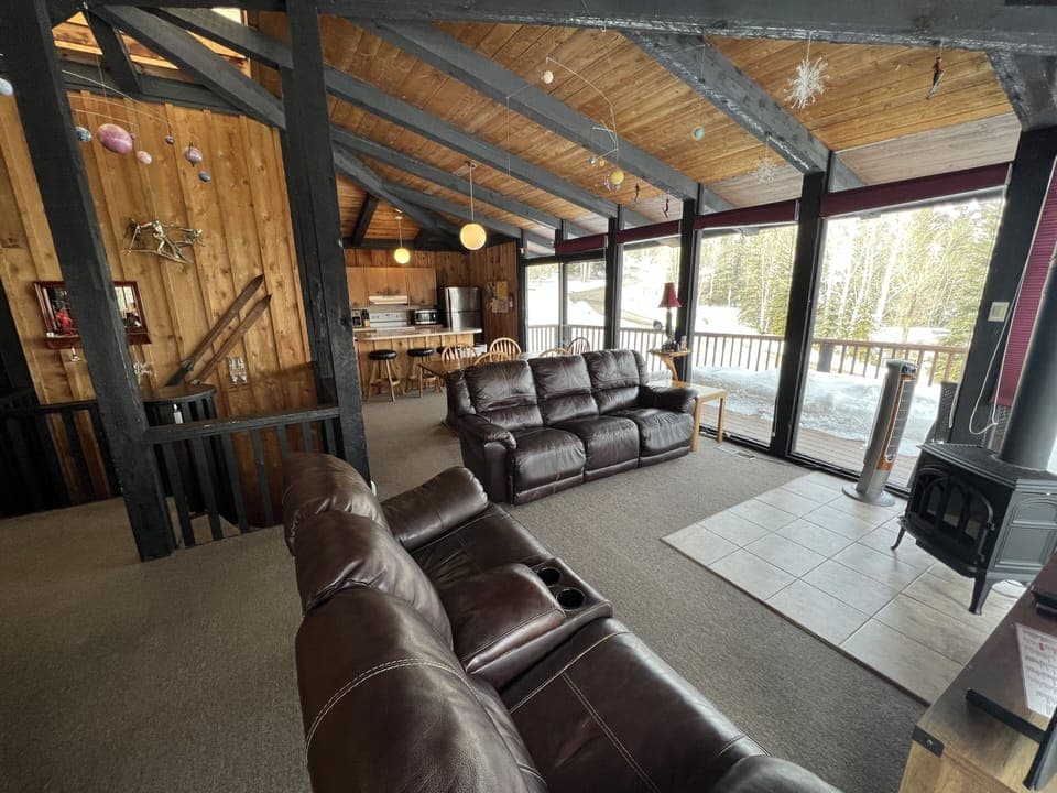 Great Room.  Note gas fireplace and floor to ceiling windows.