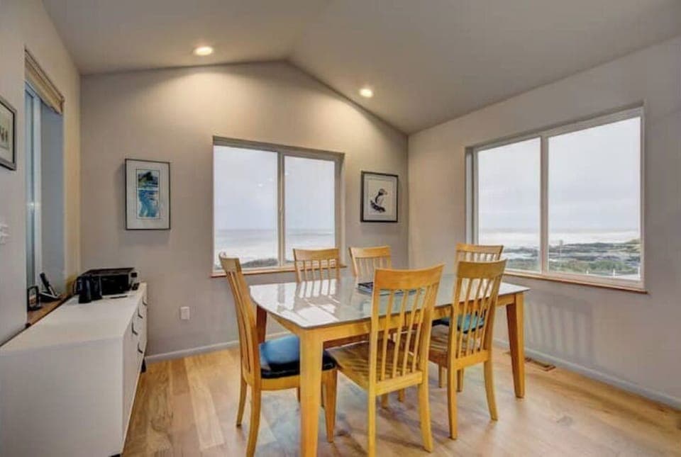 Large dining table perfect for watching the ocean while you enjoy your meals