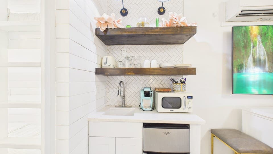 Kitchenette with basic dining and coffee essentials