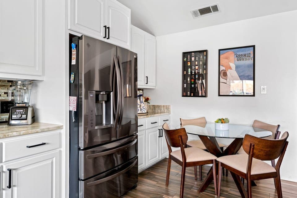 Gather with friends and family in our spacious dining area, designed to accommodate large groups and create a welcoming atmosphere for memorable meals.