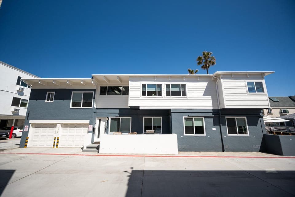 Exclusive use patio area - two chairs, small table and BBQ on elevated concrete slab