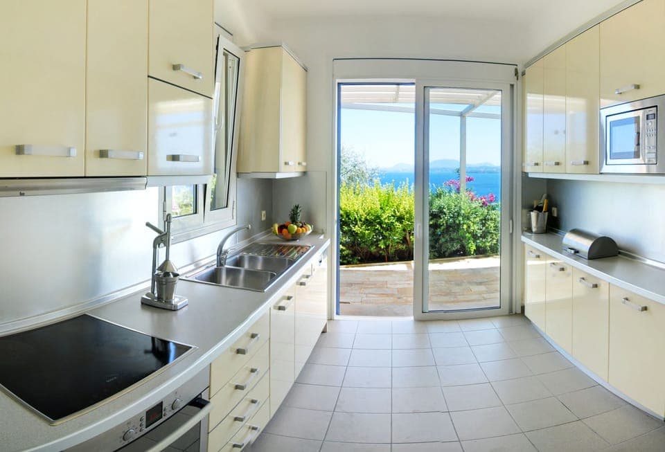 Each villa offers a full equipped kitchen next to the living room