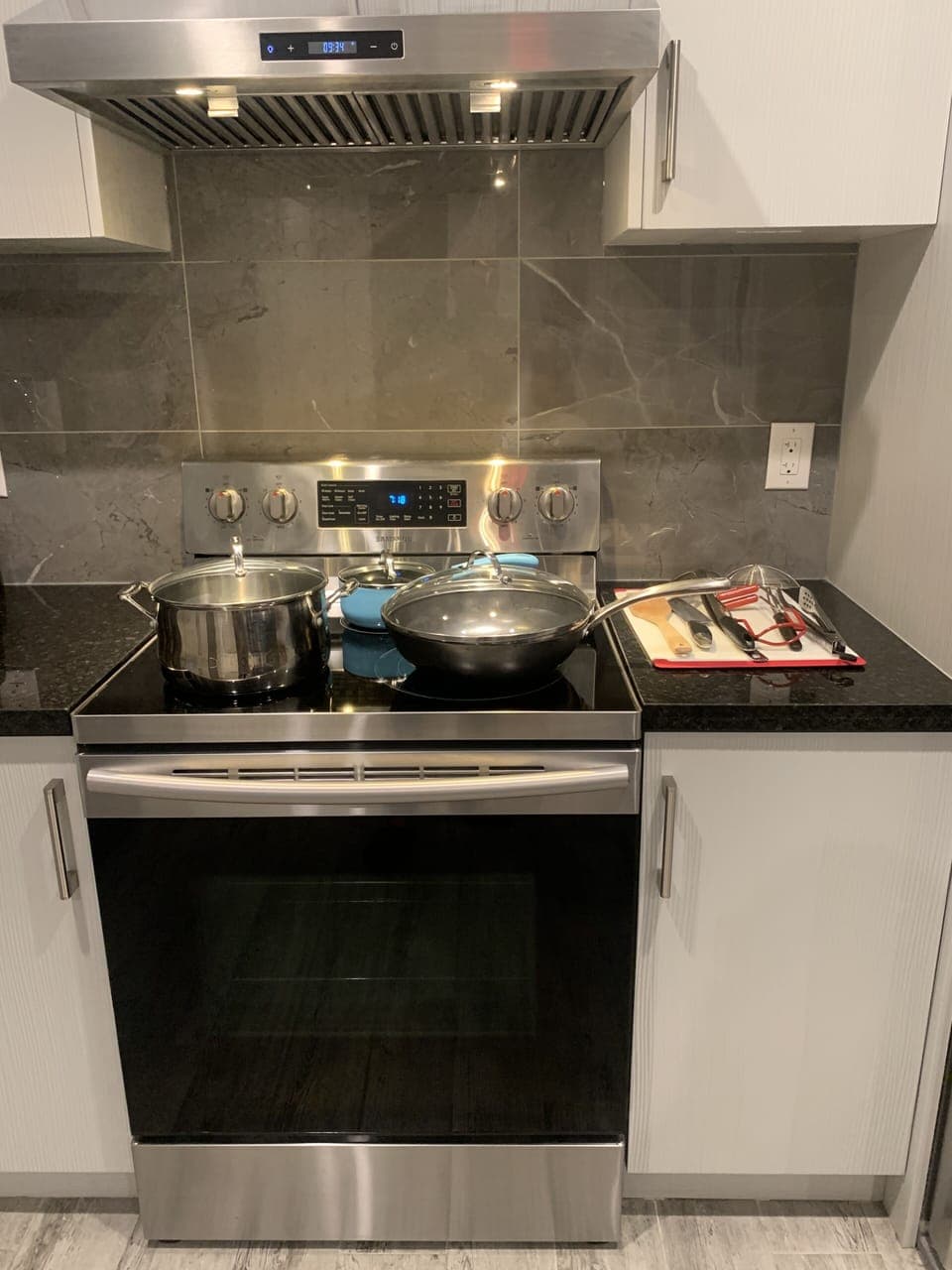 Samsung Electronic stove & oven, hoody, pots & pans, etc