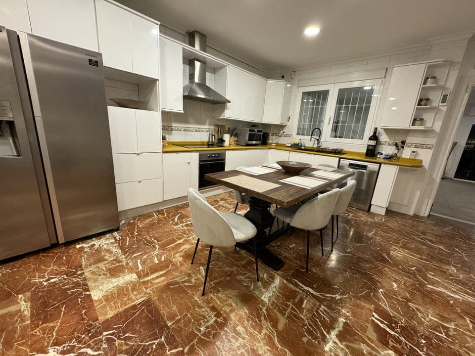 The retro 1960’s style updated kitchen with all stainless steel appliances.