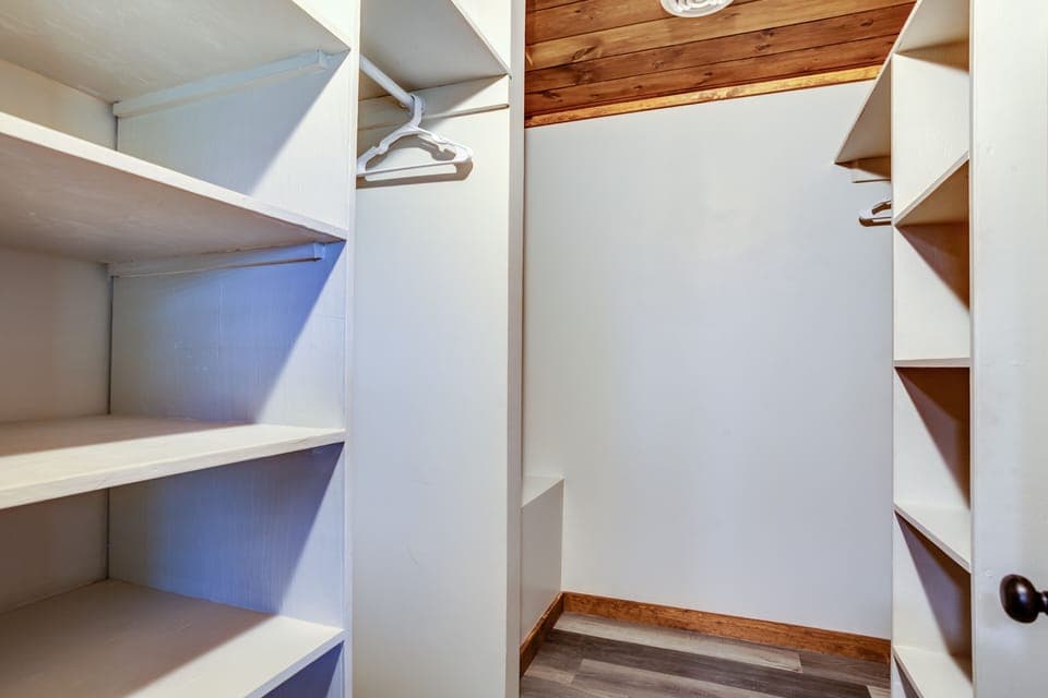 Enormous walk in closet in master bedroom