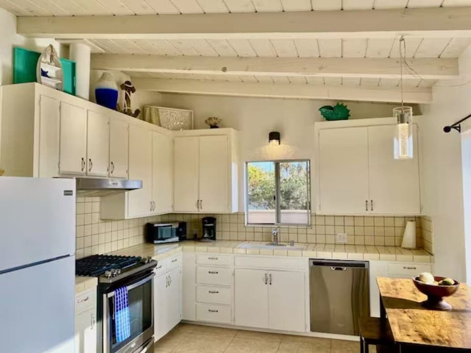 Fully Stocked Kitchen, Convection Oven, Microwave, Coffee Maker & More.