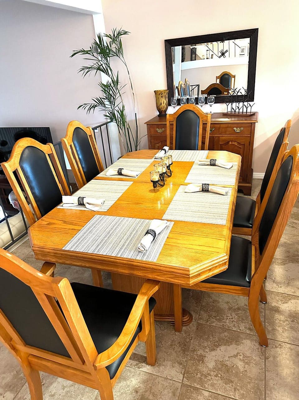 Fine dining table provided between the kitchen and the living room