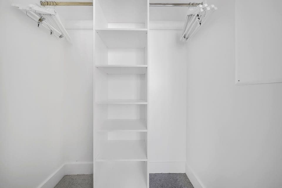 The spacious walk-in closet will accomodate all your belongings.