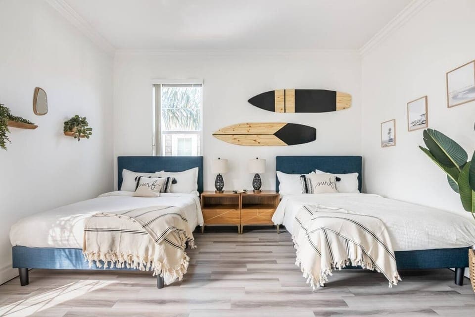 Twin full-sized beds with a Cali-coastal theme.  Perfect for a child's room