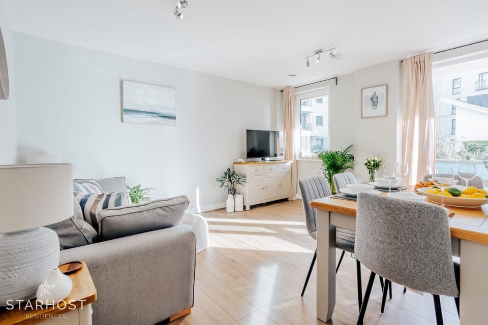 The living room is spacious with lounge & dining areas and with kitchen access