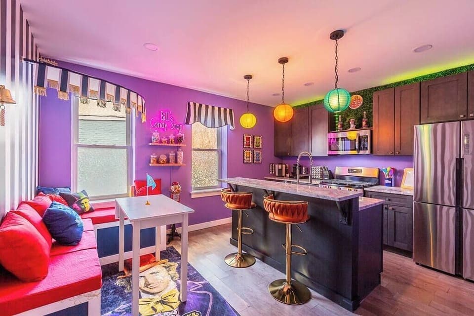 Step aboard the Wonkatania!  Our vibrant kitchen space, fully equipped with colorful cookware for creating delicious breakfasts. Enjoy the convenience of a kitchen island, perfect for two, making every meal a delightful experience.