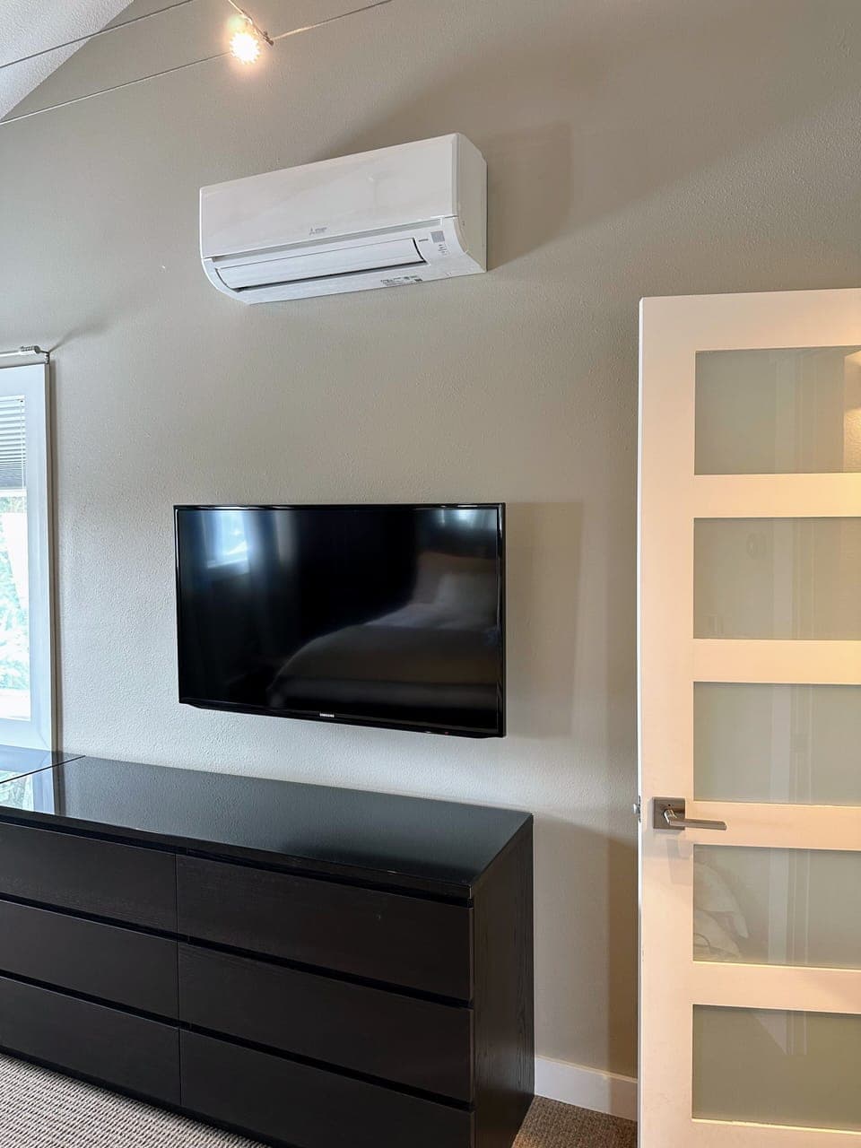 Main bedroom TV and A/C unit