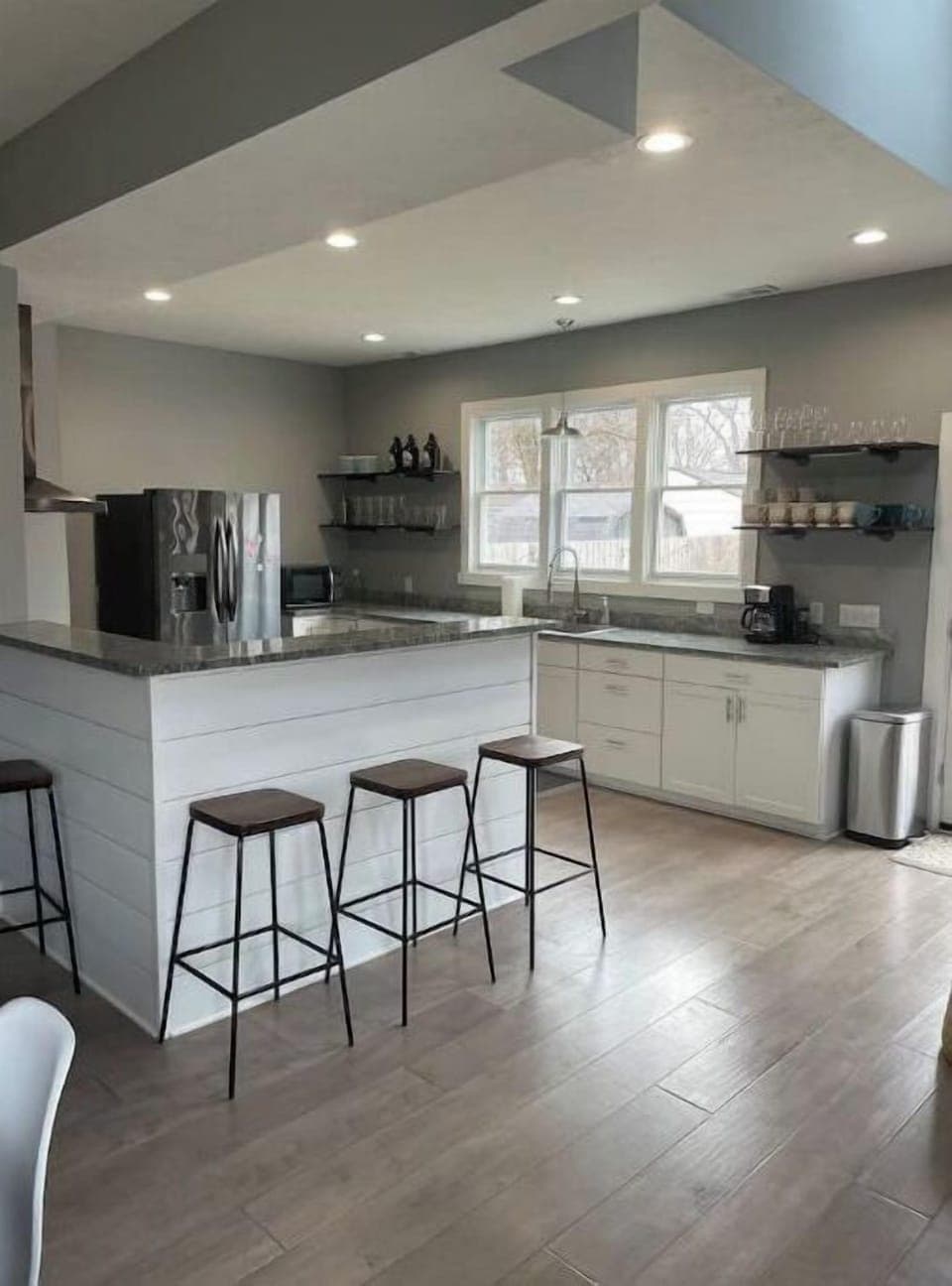 Kitchen, open concept to the dining room and 2nd living area