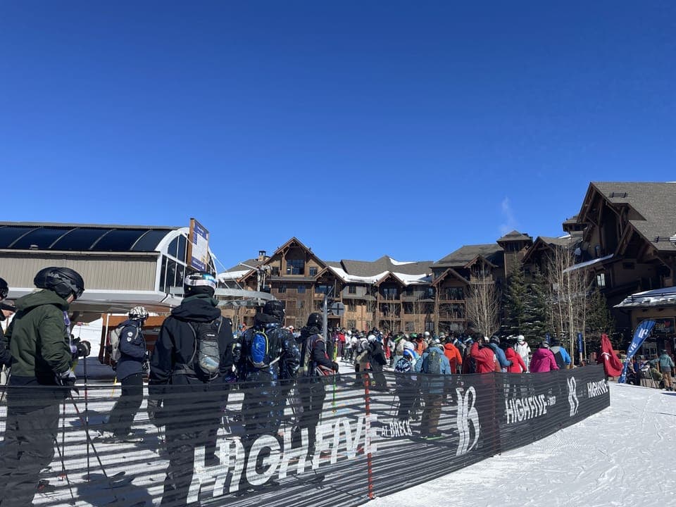 Independence Superchair with resort in background 