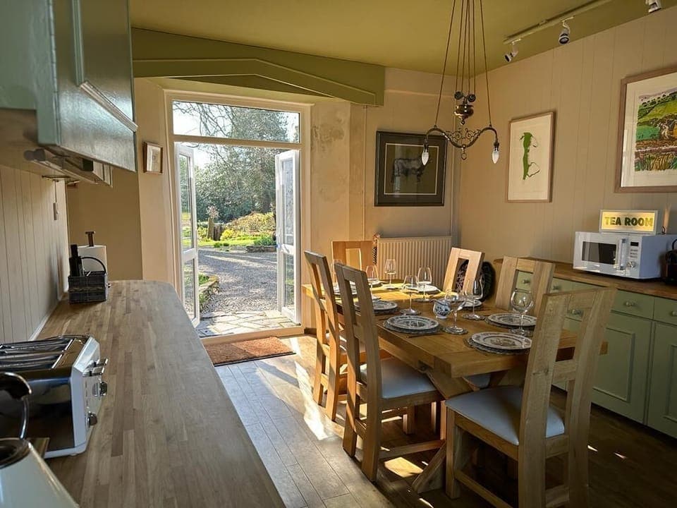 Lovely kitchen will seat 8.  French windows open to garden with outside seating 