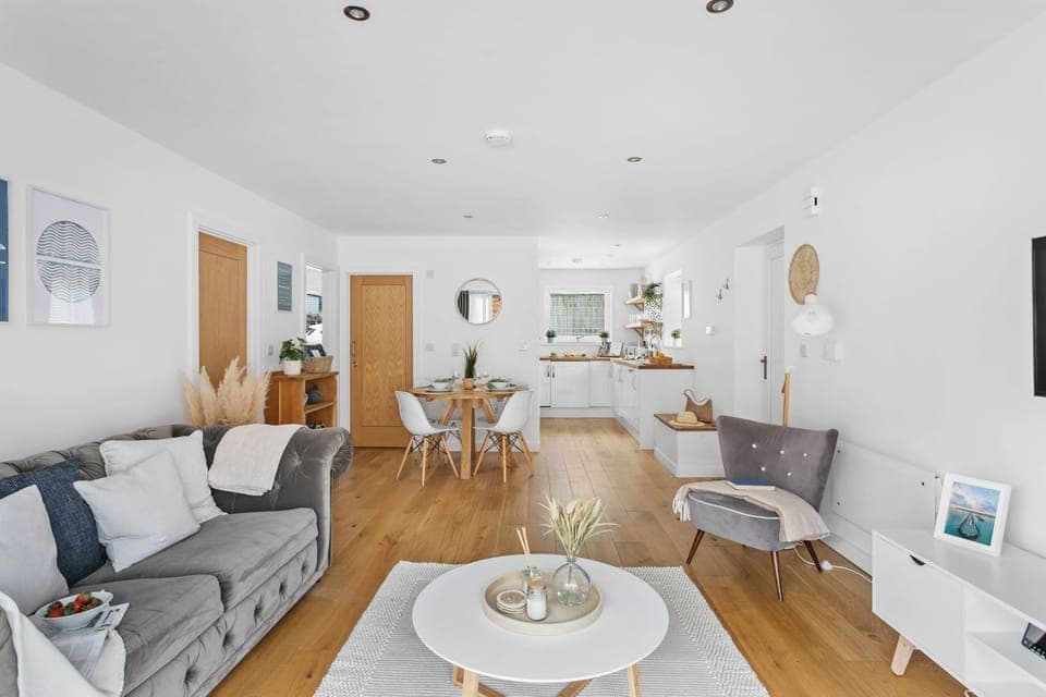 Living area leading onto the kitchen with dinging table seating for 4 - Plover 1, The Cove