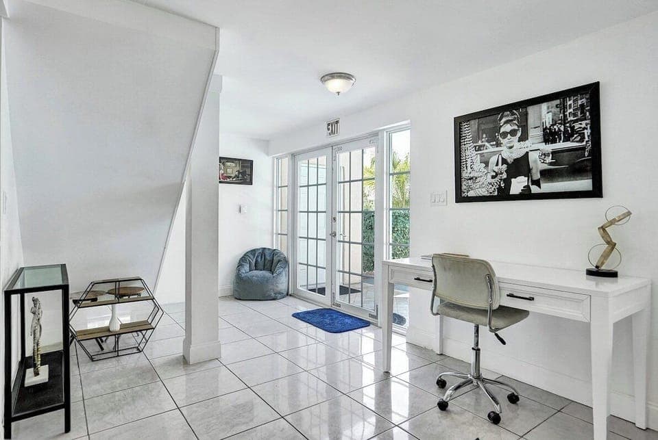 Slide open the large glass doors and let the cool morning breeze inside