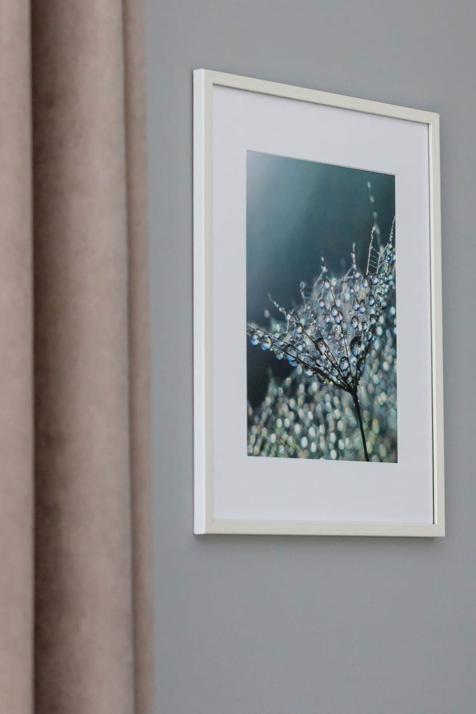 A close-up of a modern wall painting, adding character to the apartment. The abstract design complements the room's aesthetic.