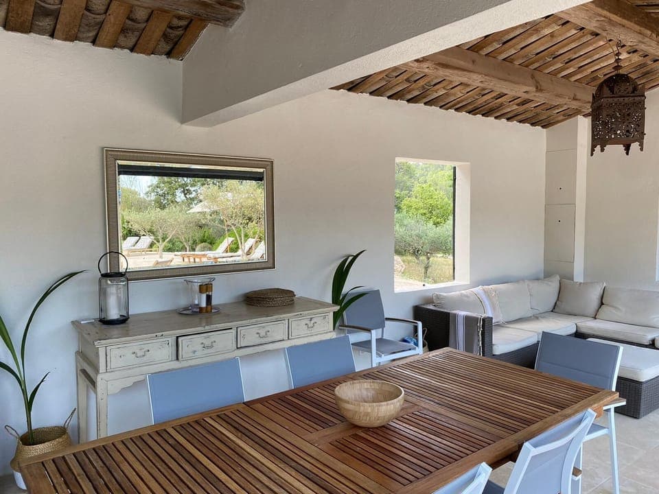 Summer outdoor kitchen with outdoor dining.