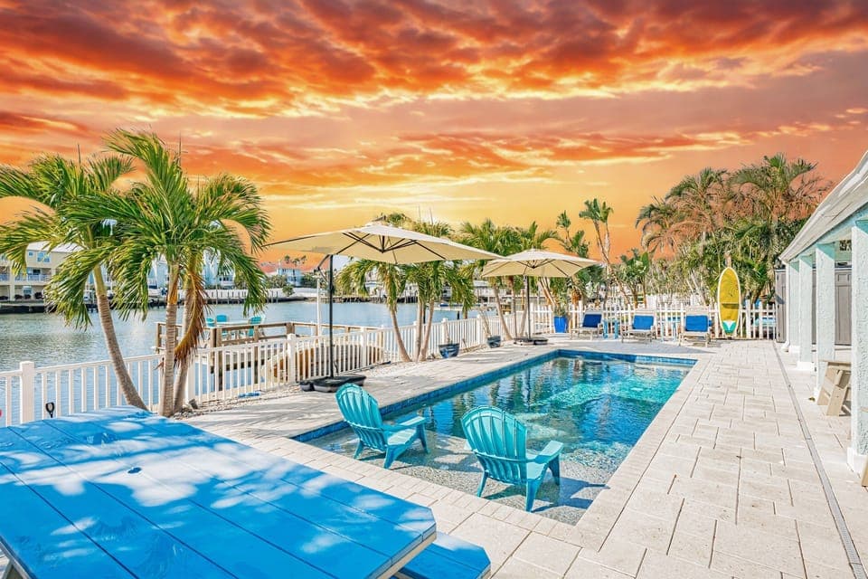 Enjoy the pool, drinks and a meal as the sun dips into the Gulf.