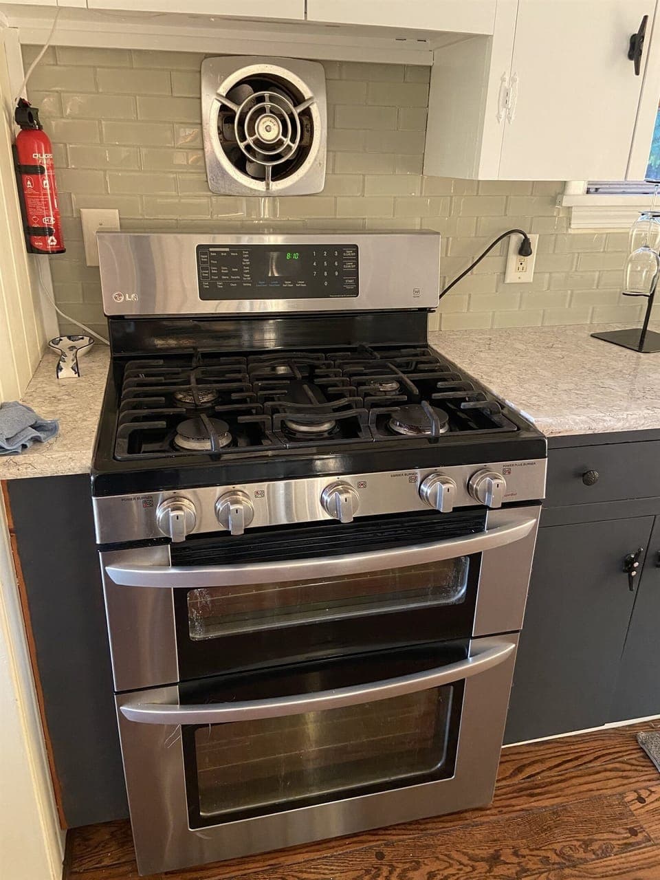 A double oven and a high end gas range is here for you. 