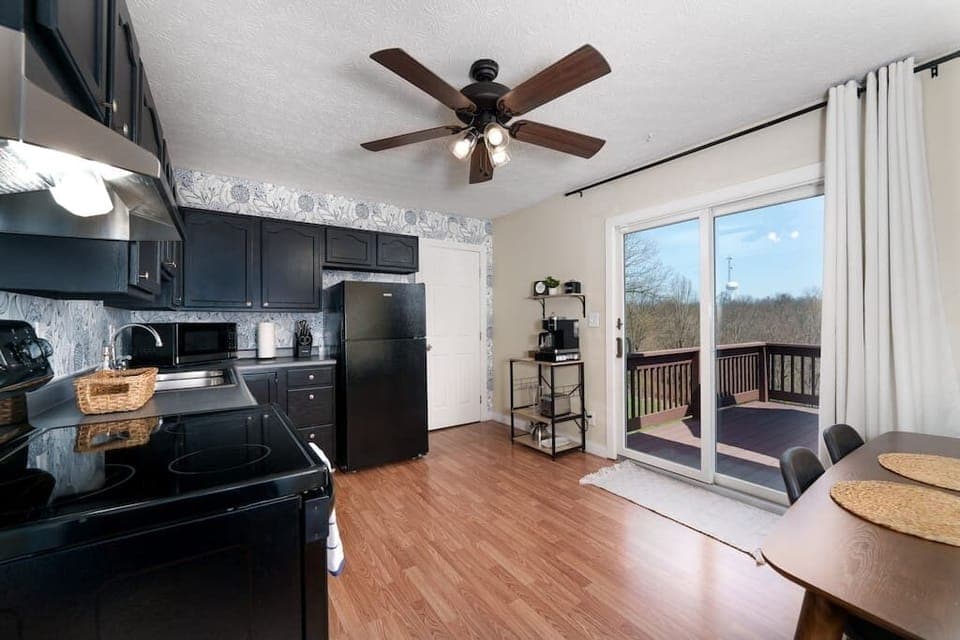 Our fully equipped kitchen has all necessities you need to whip up a meal. Baking sheets are below oven. Utensils, pots, pans, and cutting boards are in lower cabinets. Dinnerware, glassware, mugs, mixing bowls, baking dishes are in upper cabinets. 